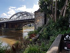 Site of the downstream, eastern end of the footbridge, below Barnes Railway Bridge, August 2021, before piling work began