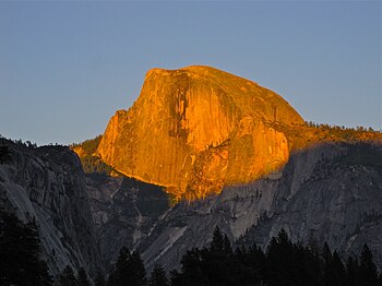 English: Sunset on Half Dome seen from near th...