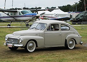 Volvo PV444 ca 1957 arriving at Schaffen-Diest Fly-drive 2014.JPG