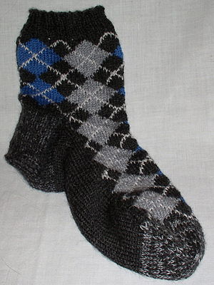 An argyle sock, knit using intarsia