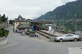 The station building can be seen to the left of the platforms (2009)