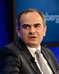 http://upload.wikimedia.org/wikipedia/commons/thumb/d/dc/Erdem_Basci_-_World_Economic_Forum_on_the_Middle_East%2C_North_Africa_and_Eurasia_2012_crop.jpg/200px-Erdem_Basci_-_World_Economic_Forum_on_the_Middle_East%2C_North_Africa_and_Eurasia_2012_crop.jpg