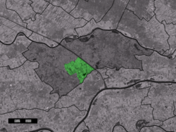 The village centre (dark green) and the statistical district (light green) of Zoelen in the municipality of Buren.