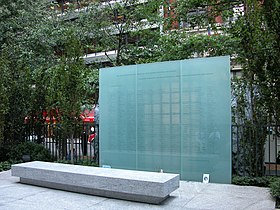 A memorial to Marsh McLennan employees who died in the 9/11 attacks, reading "Our lost colleagues are, above all, your adored children and parents, husbands and wives, sisters and brothers, your cherished relatives and friends." Marsh & McLennan 9-11 Memorial.jpg