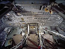 Original cockpit of the command module of Apollo 11 with three seats, photographed from above. It is located in the National Air and Space Museum; the very high resolution image was produced in 2007 by the Smithsonian Institution. NASM-NASM2013-02663.jpg