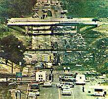 Debris from Northwest Airlines Flight 255 scattered across Middlebelt Road after crashing on August 16, 1987. NW255 crashsite.jpg