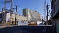 Odasakae level crossing in January 2016, with the up platform under construction on the right