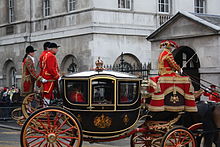 The State Coach carrying the Imperial State Crown, which is visible through the central window. State Opening of Parliament 2008 IV (3082940384).jpg