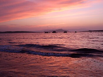 English: Twilight on the Chania beach. Chania ...