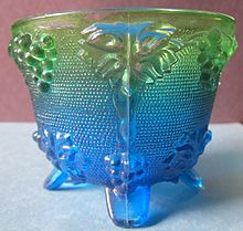 A bowl made from cast-glass. The two halves are joined together by the weld seam, running down the middle. Cast glass bowl showing the weld seam.JPG
