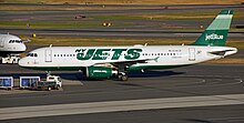 JetBlue honors the NY Jets with its green plane. JetBlue Jets.jpg
