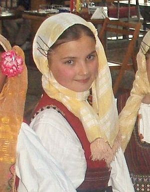 A Macedonian girl in a traditional folk costume