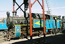 Black-and-blue locomotive, converted from coal to oil firing