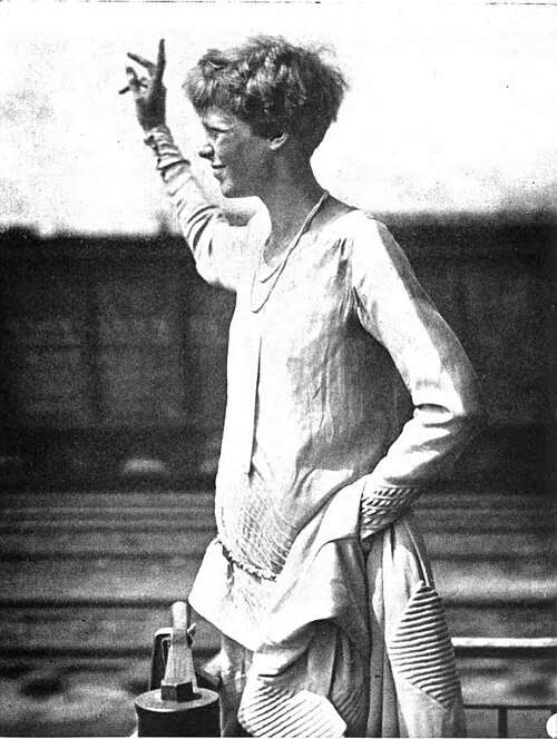 Amelia Earhart waving goodbye