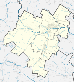 Mapa konturowa powiatu skarżyskiego, po lewej znajduje się punkt z opisem „Parafia Przemienienia Pańskiego”