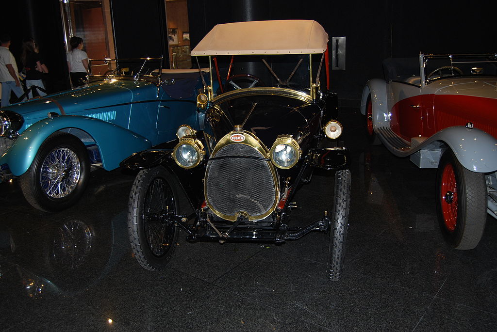 FileVery old Bugatti flanked by two 30s roadsters Flickr wbaivjpg