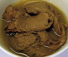 Photo of vegetarian "mock duck" made of wheat gluten in a brine with seasonings.