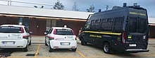 Two private security cars (Fiat Puntos) in Milan 2015 with a Guardia di Finanza van " 15 - EXPO MILANO 2015 - Vigilanza Fiat Grande Punto security emergency financial guard.jpg