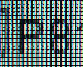 Red, green, and blue subpixels on an LCD display.