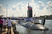 USS John Warner at her commissioning ceremony on 1 August 2015, with forward Virginia Payload Tube hatch open 150801-N-EO381-162.JPG