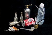 Various paraphernalia used to smoke crack cocaine, including a homemade crack pipe made out of an empty plastic water bottle. Crack-paraphernalia.jpg