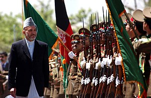Hamid Karzai reviews troops of the first gradu...