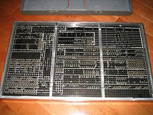 Reverse side of the same 402 plugboard, showing the pins that make contact with the machine's internal wiring. The holes were called hubs. IBM402plugboard.Shrigley.pinside.jpg