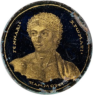 Gold glass medallion of a youth named Gennadios, who was "most accomplished in the musical arts". Probably from Hellenized Alexandria, Egypt, c. 250-300. Diameter 4.2 cm (1 5/8 inches) Medallion with a Portrait of Gennadios MET DP325825 (cropped).jpg