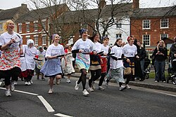 A pancake race in Olney, Buckinghamshire, 2009 Olney Pancake Race 2009.jpg