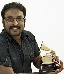 P.A.Deepak kun lia Grammy Award.jpg