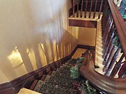 Staircase leading back to the first floor of the Niels Petersen House.