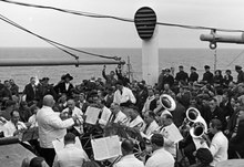 Travelers aboard a KdF cruise enjoying an orchestra performance Wilhelm Walther, An, Bord, 1 EF, KDF', +, 1-131-132-8164.tif