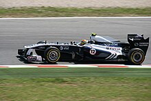 Photographie de Pastor Maldonado dans sa monoplace au Grand Prix automobile d'Espagne