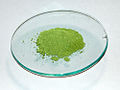 Copper(I) chloride, a copper(I) compound. It is white but air reacts with it easily to turn it green