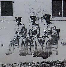 Three BVRC senior NCOs, including 683 Sergeant Edward A. Lee (right), later a CSM of the Caribbean Regiment. Three BVRC Senior NCOs at Royal Naval Dockyard Bermuda ca 1940.jpg