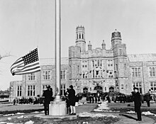 First flag raising, commissioning ceremonies for the U.S. Naval Training Center, Women's Reserve, Bronx, on February 8, 1943 80-G-23753 - First flag raising, commissioning ceremonies for Hunter College (1943).jpg