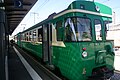 Voiture-pilote Bt 54 du BAM marquant l'arrêt en voie 5 de la gare.