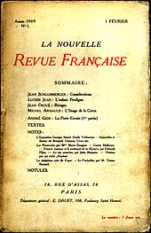 Couverture d'une revue portant des caractères noirs et rouges.