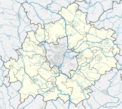 Mapa konturowa powiatu poznańskiego, blisko centrum na prawo znajduje się punkt z opisem „Swarzędz”