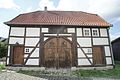 Fachwerkremise beim Haus Thoholte mit Krüppelwalmdach u. Querdeele aus dem 18. Jh.