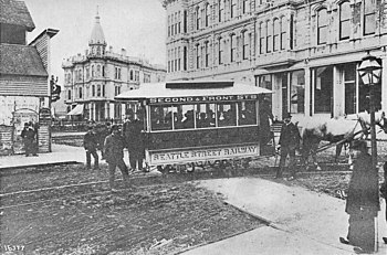 Horse-drawn streetcar at what is now the corne...