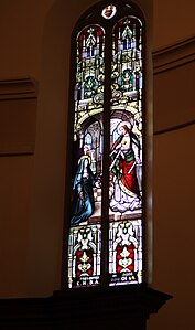One of the two windows covered in the 1967 alterations and then uncovered again in 2001.