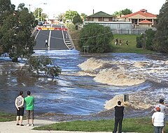 Werribee River in flood over cottrell street in Werribee.jpg