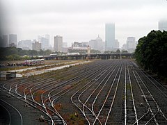 Beacon Park Yard, empty of CSX cars, in 2014. The MBTA train at left was being used for the press conference announcing plans for West Station