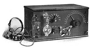 De Forest's first commercial Audion receiver, the RJ6 which came out in 1914. The Audion tube was always mounted upside down, with its delicate filament loop hanging down, so it did not sag and touch the other electrodes in the tube. De Forest RJ6 Audion radio receiver.jpg