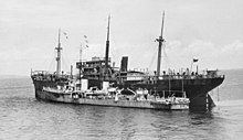 Tenedos, 3 February 1942, alongside a damaged merchantman in the Bangka Strait. Note her reconfigured stern, which had been altered for minelaying. HMS TENEDOS (H04) ALONGSIDE SS NORAH MOLLAR 3 FEB 1942.jpg