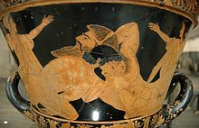 Vase antique à fond noir : deux hommes luttant