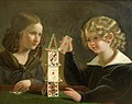 De dochter en de zoon van Jan Maszkowski bouwen een kaartenhuis