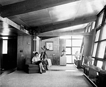 Judith Heidelberger in the living room of the house, 1952