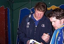 Malcolm O'Kelly en train de signer un autographe